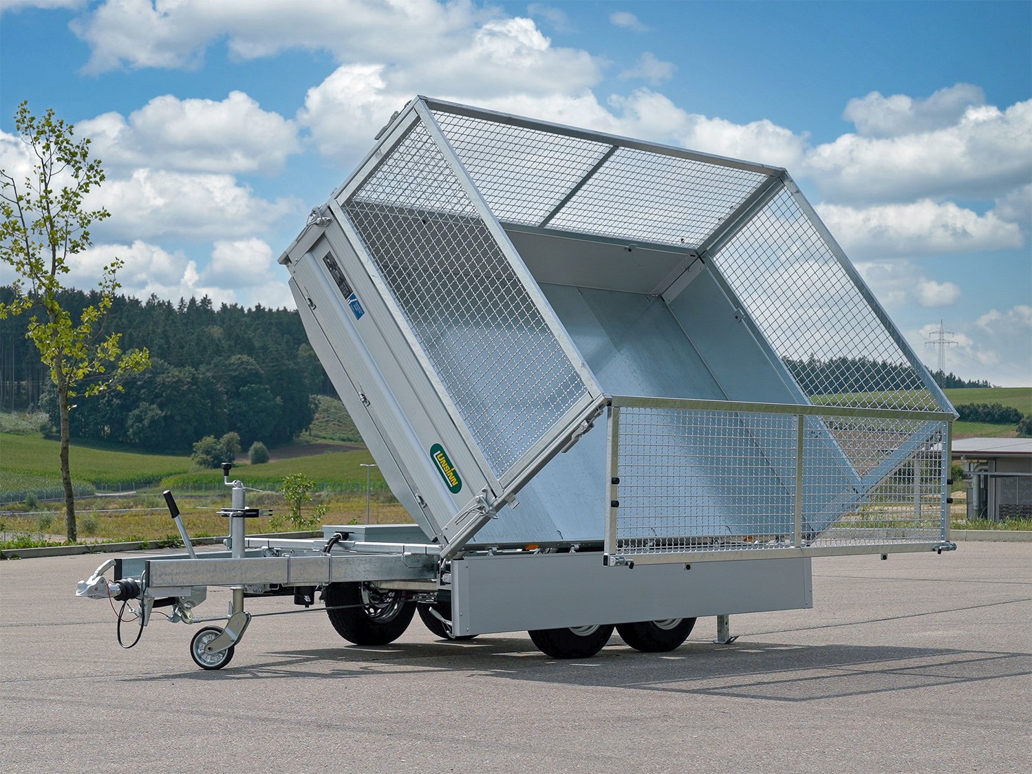 Unsinn 3-Seiten-Kipper UDK 3017-30-14 – Gitteraufsatz E Pumpe Stahlboden Spinlock – Ladefläche 306 × 175 cm – 3000 kg – Tandemachser – Ansicht 1